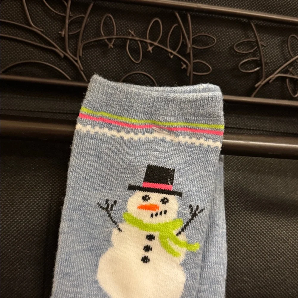 NWT pair of colorful Holiday/Winter socks.  Never been worn of course. Adult 7-9